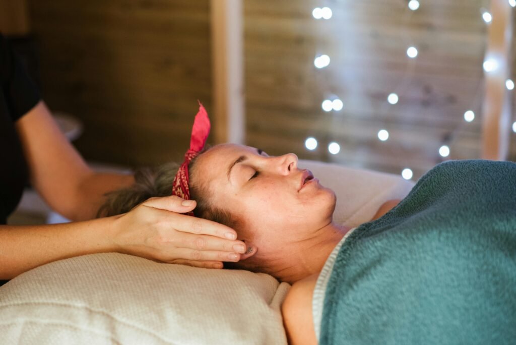 Yolanta providing a Reiki healing in Peterborough.